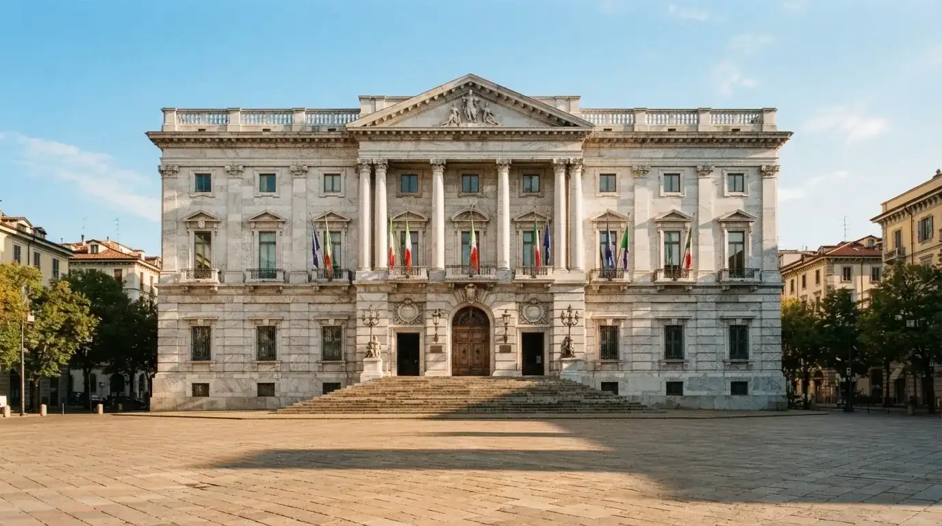 Palazzo istituzionale con bandiere al vento in una piazza soleggiata — big time gaming live casino italia